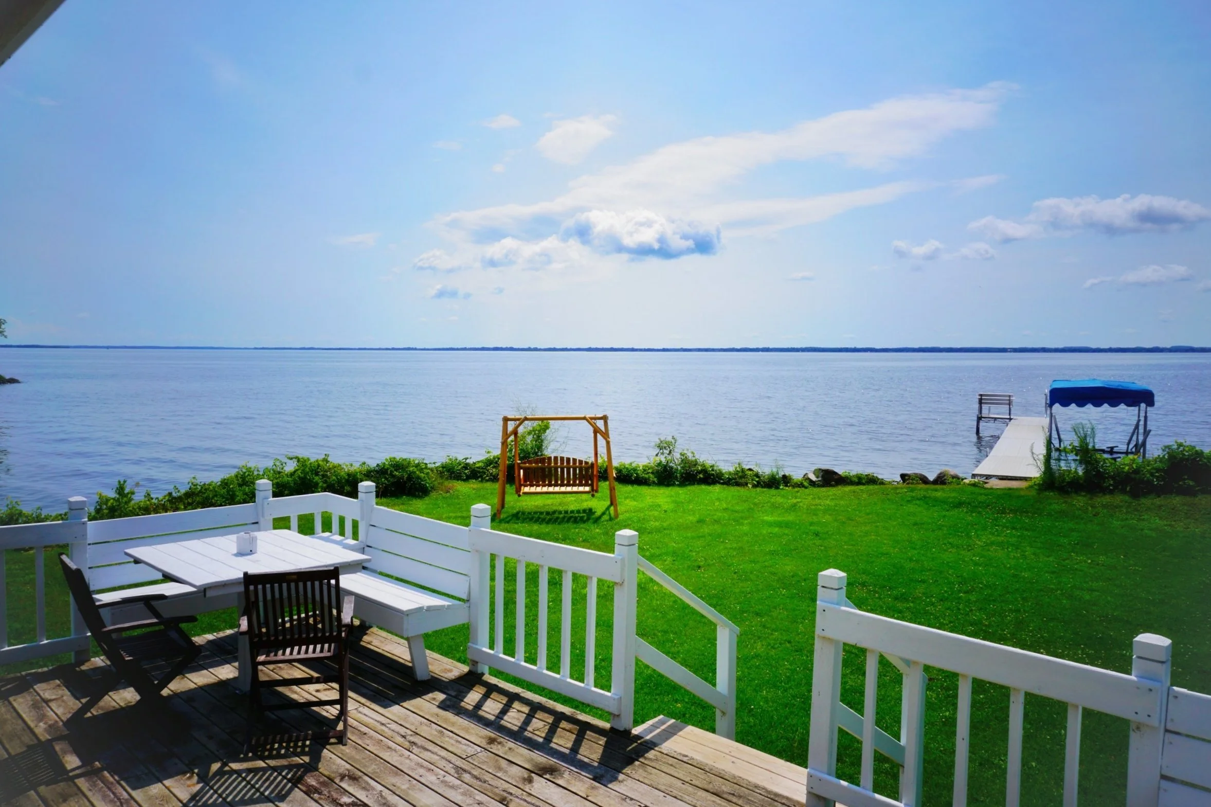 Norwegian-Bay-Cottage-deck-swing.jpg