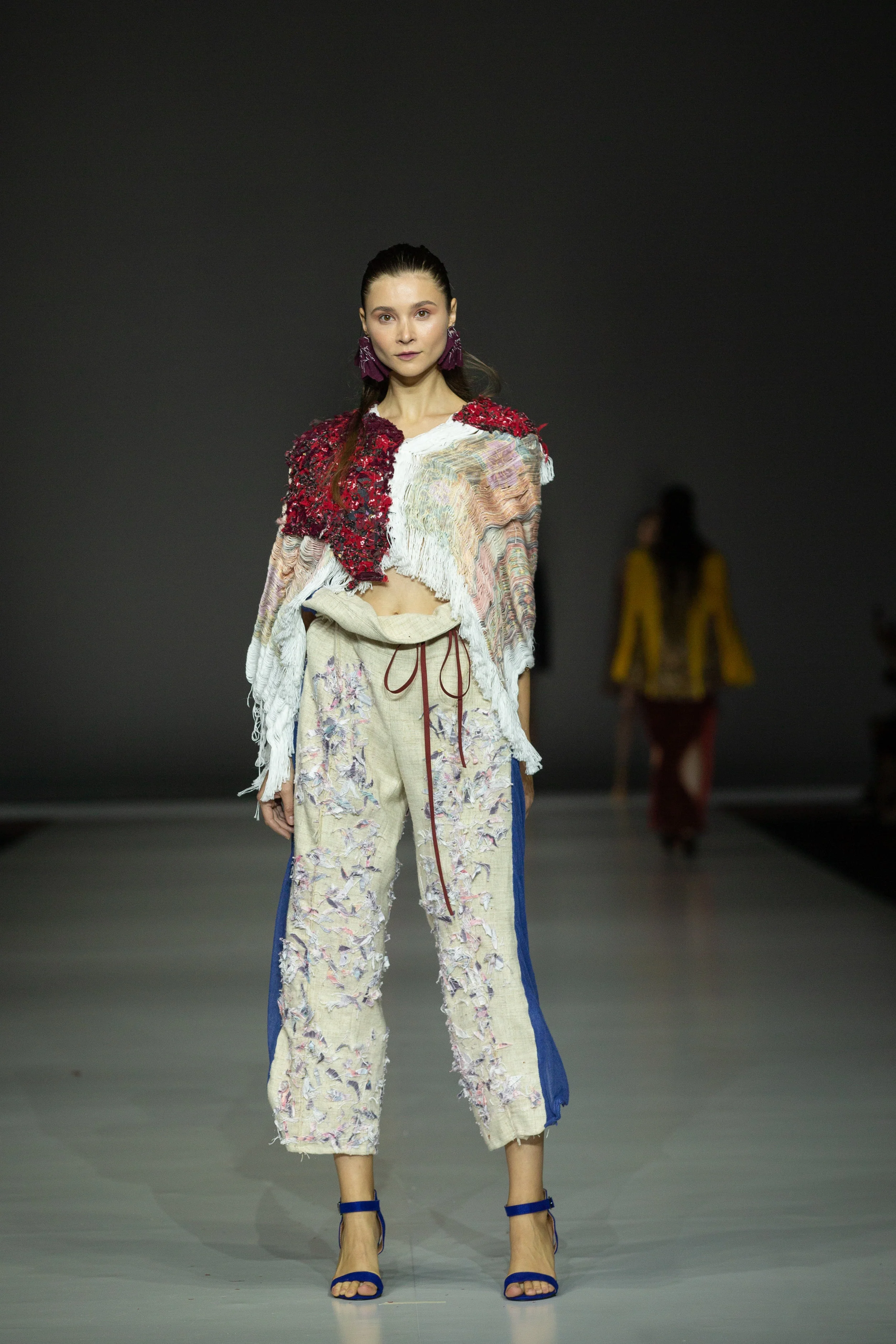 Ganit Goldstein Up-cycled high-waist trousers and asymmetric fringed, woven top made from a mixture of shredded textile waste and industry surplus textiles