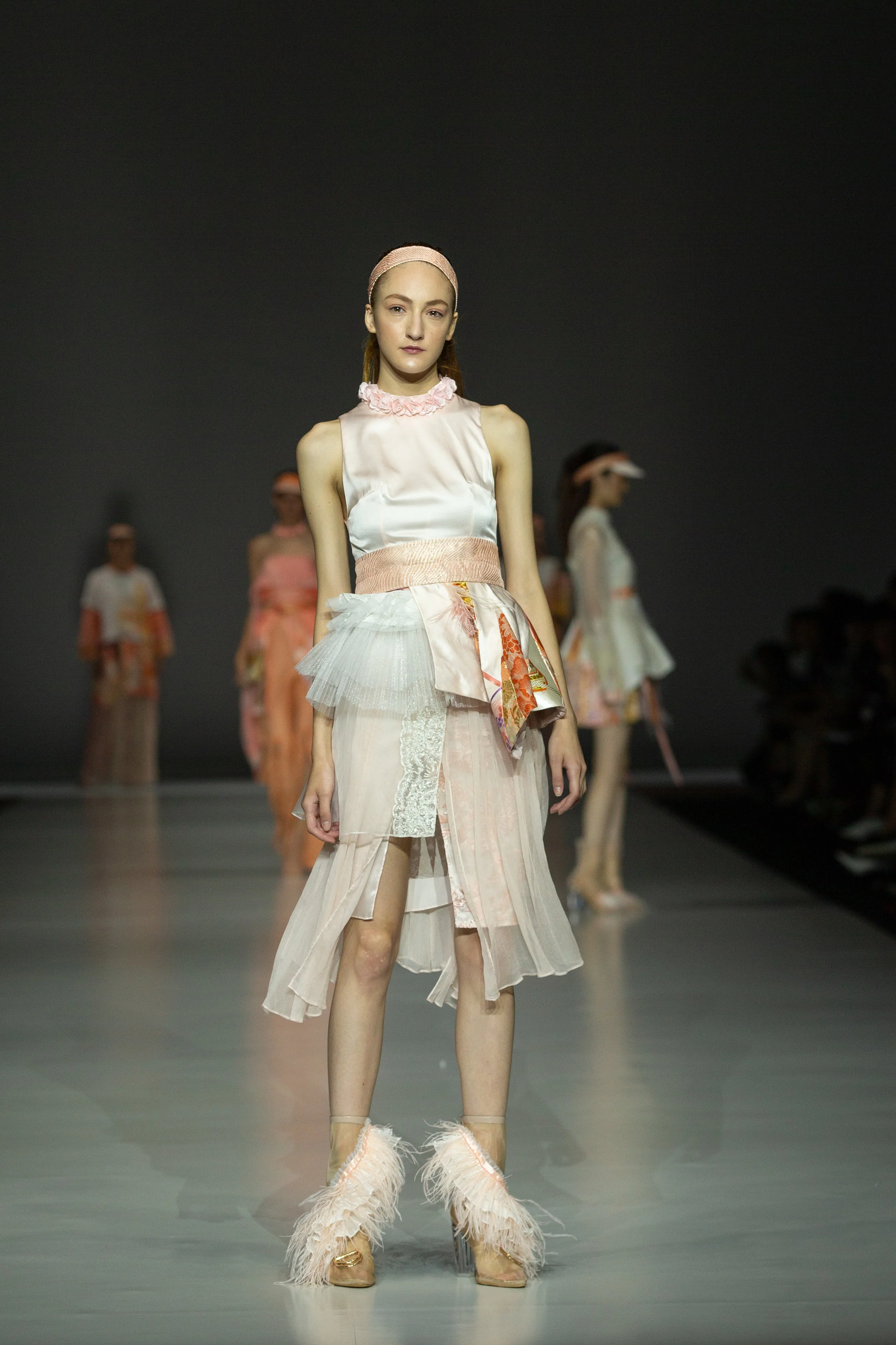 Wei-Yu Hung Up-cycled and reconstructed peplum top made with secondhand obi and textiles sourced from bridal wear production, paired with layered chiffon skirt up-cycled from wedding dress samples