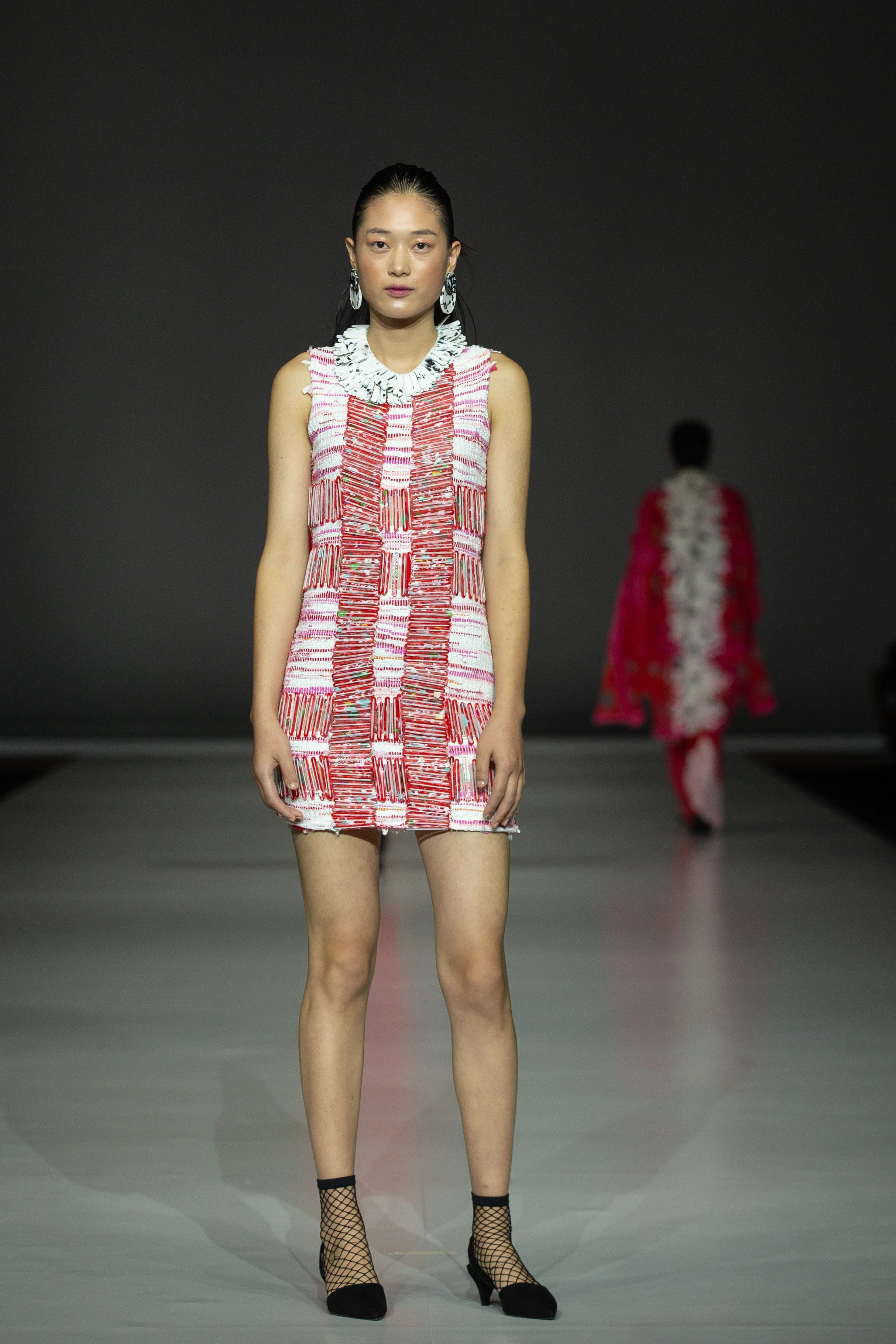 Melissa Villevielle Zero-waste mini-dress made with recycled PET yarn and embellished with handmade recycled plastic (PET) beads
