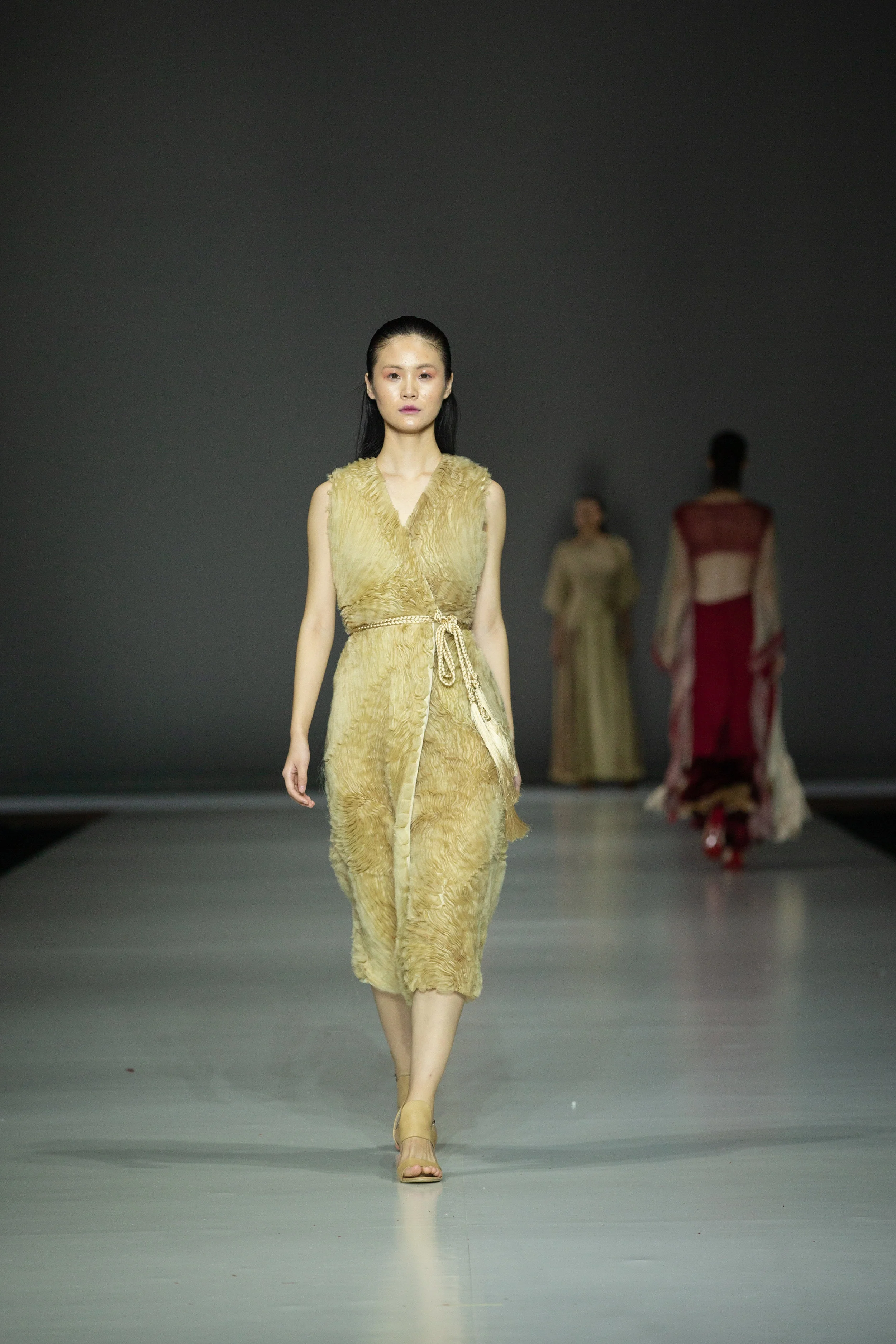 Seerat Virdi Up-cycled textured wrap dress made with silk organza and micro net textile waste