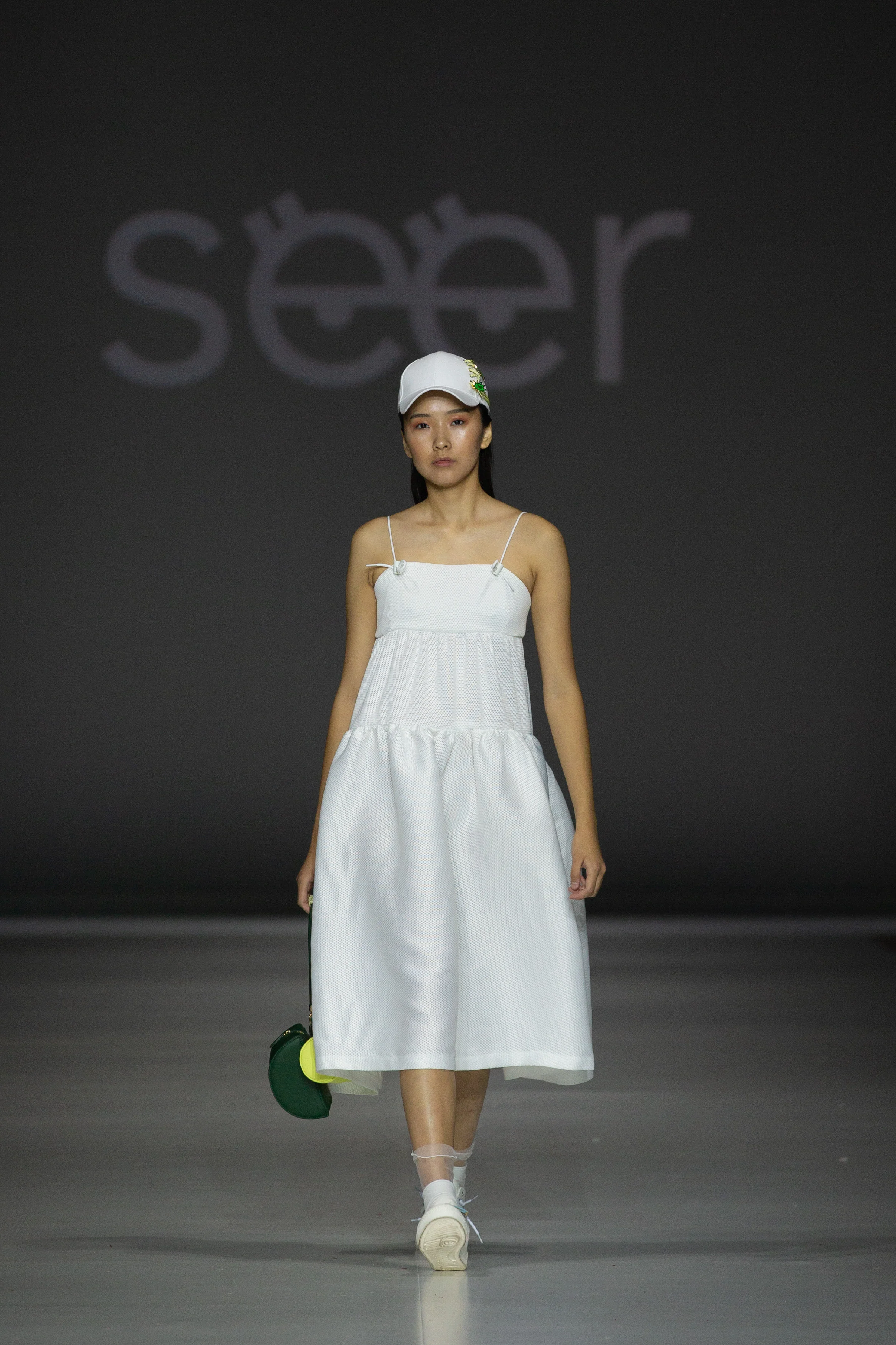 SEER THE LABEL Cher Chan - Redress Design Award 2014/15 Finalist White puffy tiered dress, up-cycled from industry waste textiles sourced in Hong Kong. Enquiries: seerthelabel@gmail.com