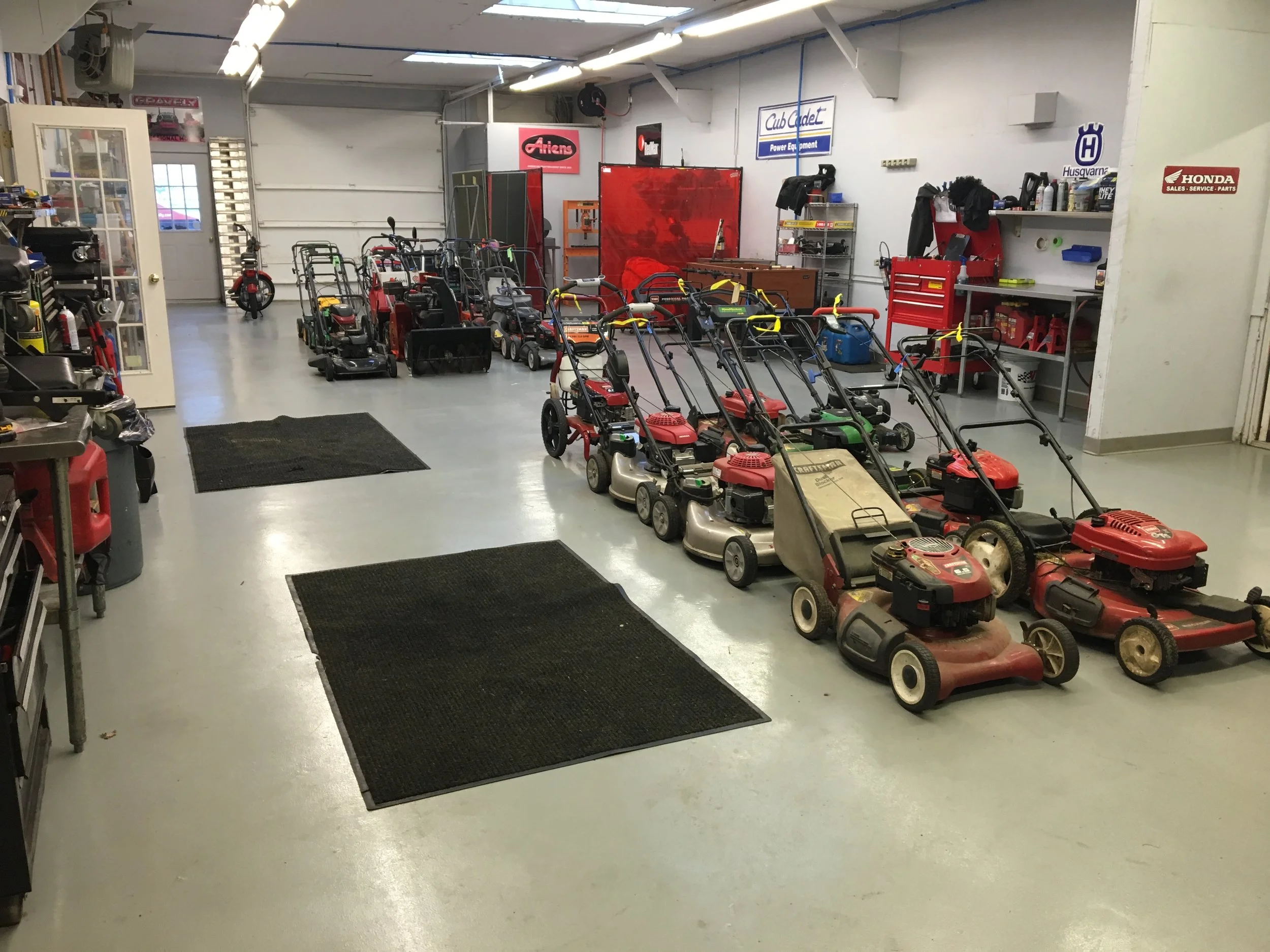 Inside_shop_with_mowers.jpeg