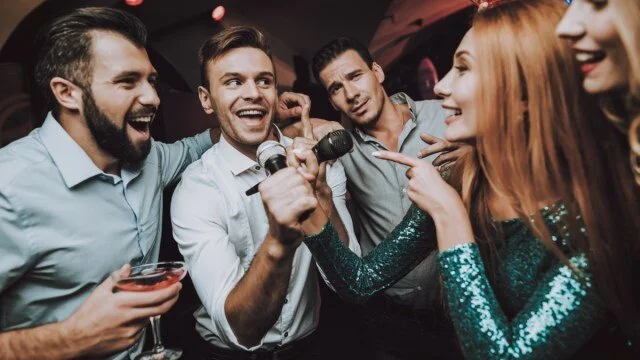 friends-singing-karaoke-bar-alcohol.jpeg