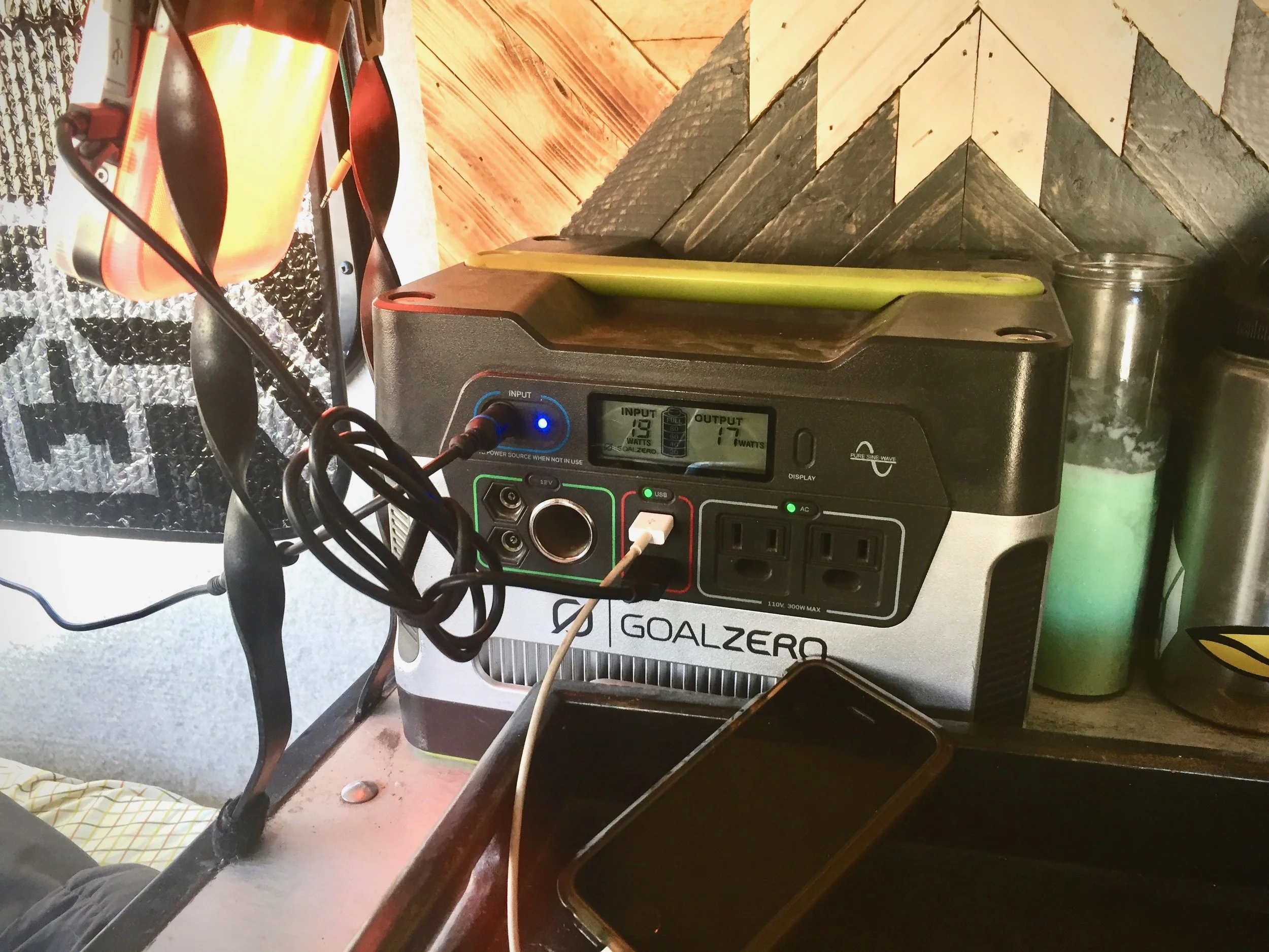 Yeti 400 Charging Biolite BaseLantern and iPhone SE. 19 watts input from Escape 30 Panel (old school). 17 watts output to BaseLantern and iPhone.