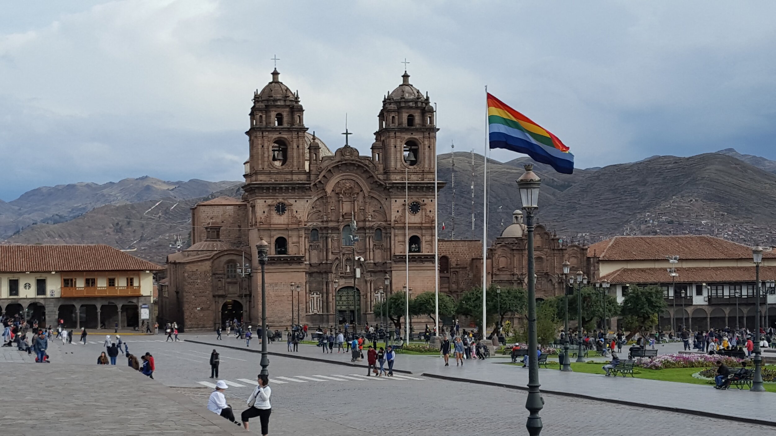 Cusco Main Plaza with flag.jpg