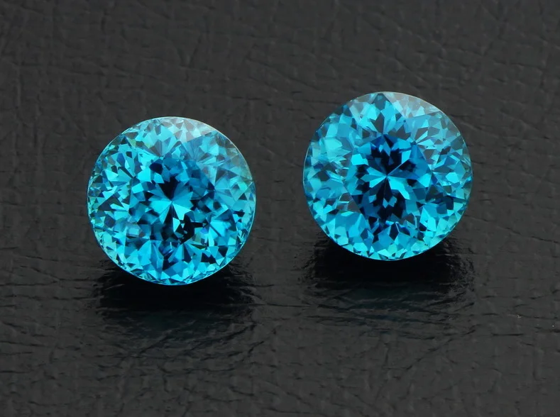 Zircon Blue Pair 2pc-21.08ct Vfn Rd (1).jpg