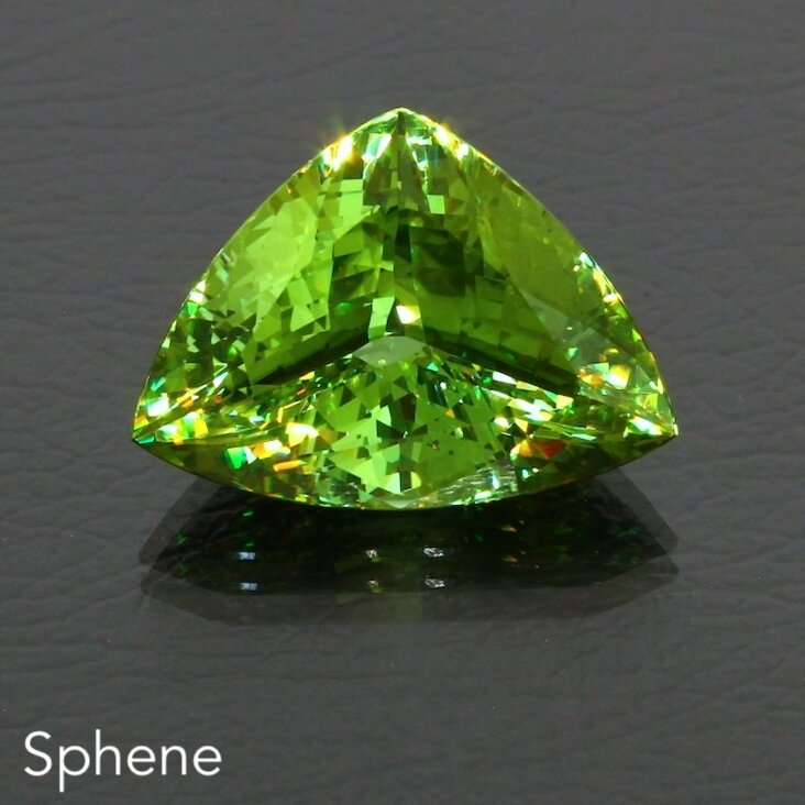 Sphene 19.25ct Gr wide tr db 11478 _Fire1.JPG