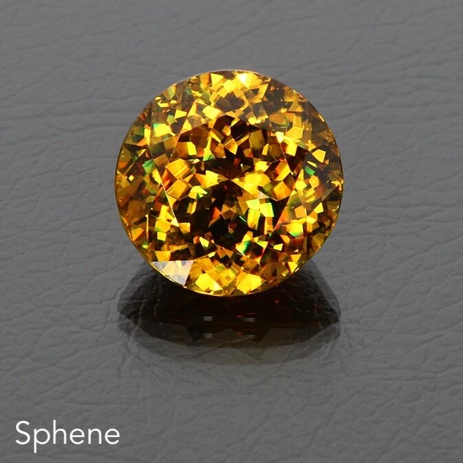 Sphene 20.47ct Gold Rd Mad db 67814 3.JPG