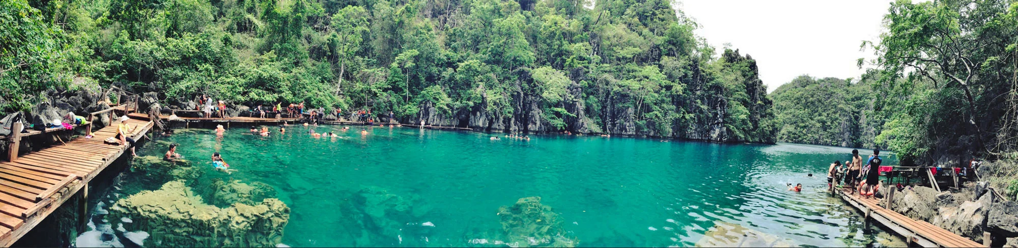Tourist enjoy swimming in Kayangan Lake, Coron Island
