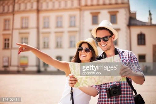 http://www.gettyimages.com/detail/photo/caucasian-couple-checking-photos-on-digital-camera-royalty-free-image/580496441