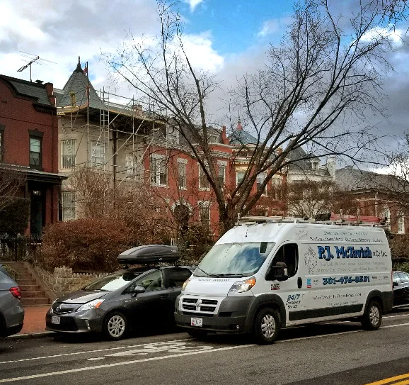 Above: P.J. McTavish & Company installing a slate roof on Capitol Hill. 