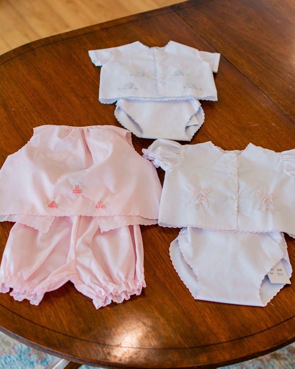 Summer baby gifts are flying off our shelves! These diaper sets have shadow stitching and hand embroidery.