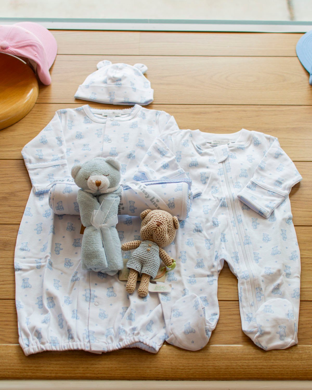 A blue teddy bear bundle from Kissy Kissy. Can we just thank whoever put bear ears on baby hats?