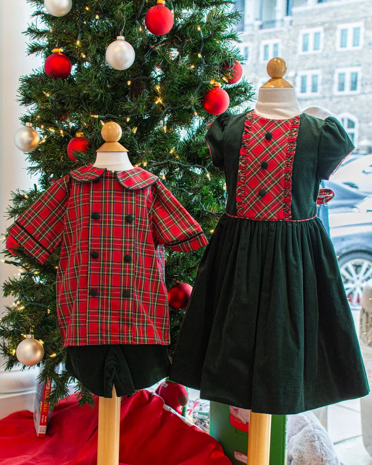Swipe through some formal outfits for the holidays! The Bailey Boys matching sibling sets in green corduroy and plaid. A gorgeous blue dress for older girls and a Johnnie-O formal style for boys. A plaid dress from Rachel Riley and a white holiday st