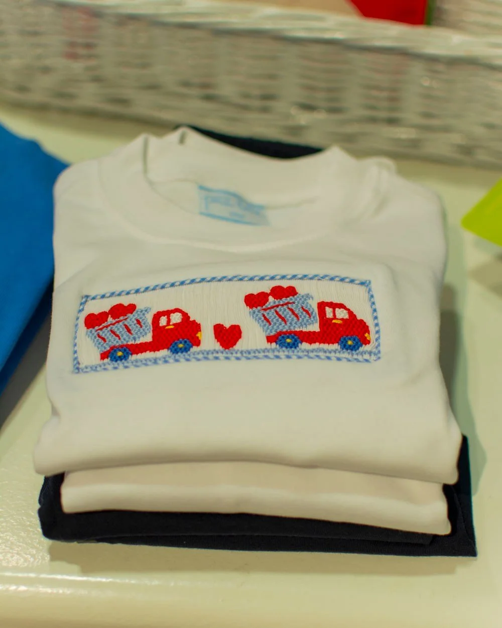 Smocked airplane hearts, dump truck hearts, and puppy love for boys. ✈️