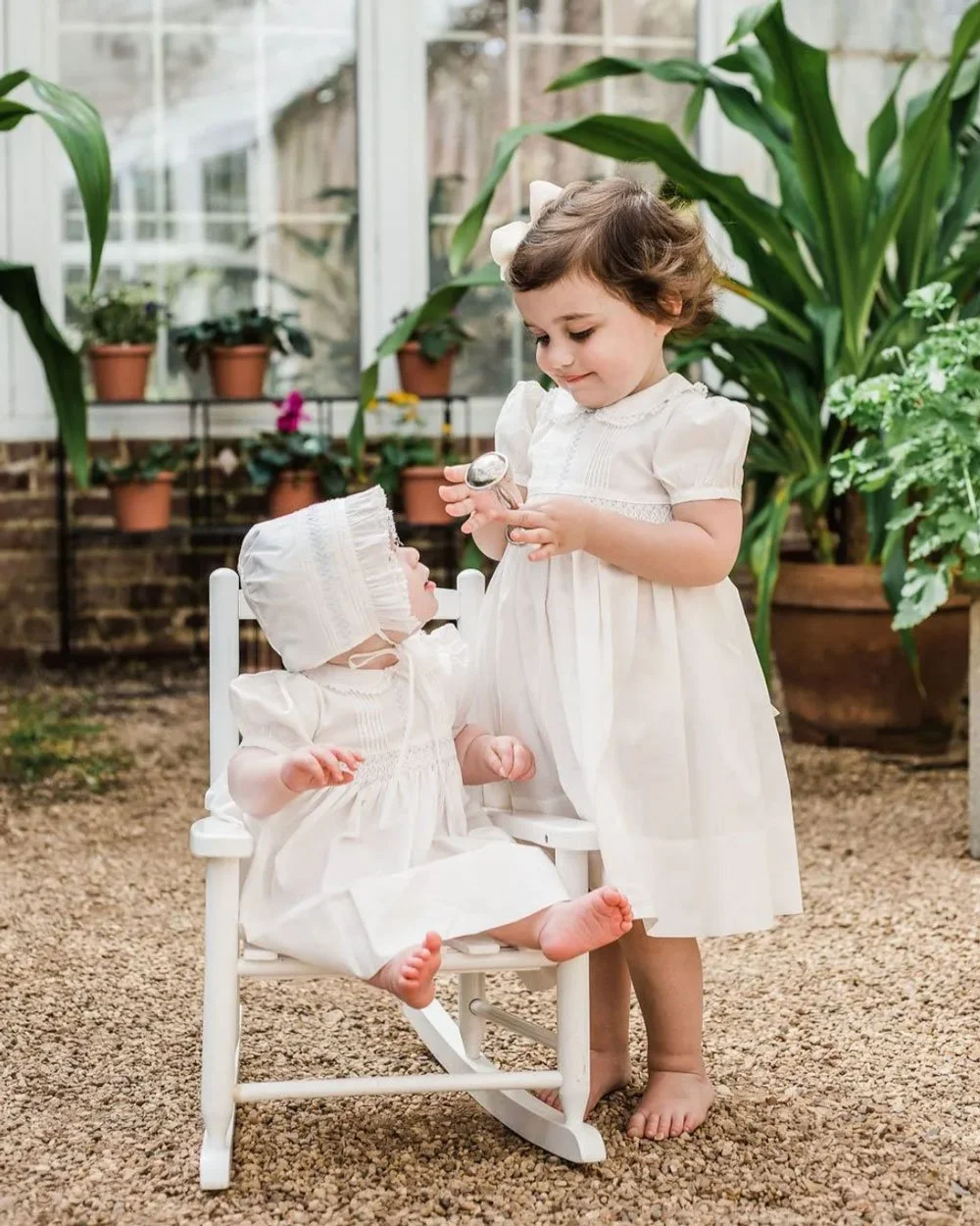 The Vintage Dress from Feltman Brothers makes a stunning choice for a portrait dress with its delicate details. Featuring hand embroidery, as well as tiny hand-stitched pintucks and fluted French lace trimming the collar. 💙