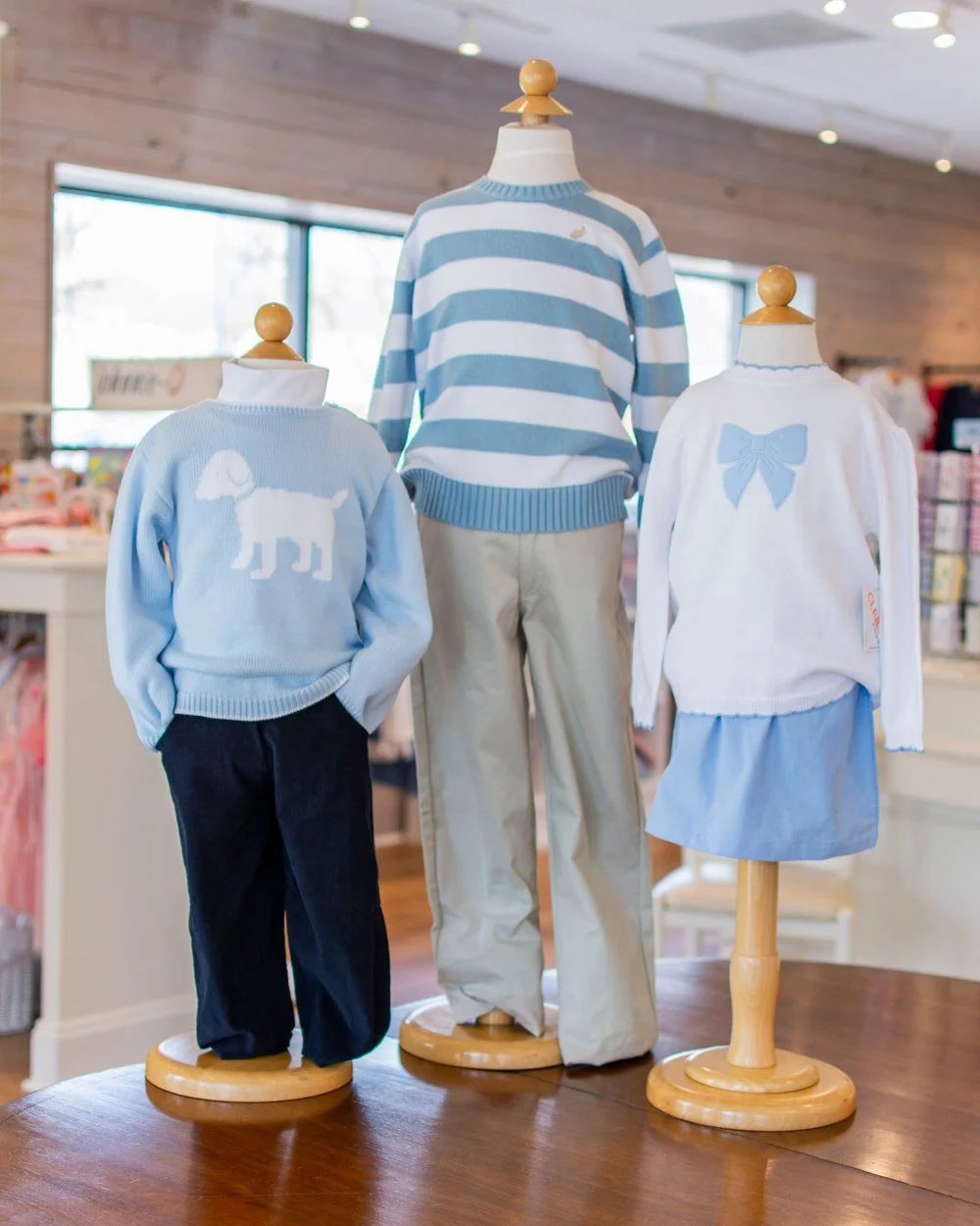 A blue and white moment today! 💙 Blue puppy sweater from Zubels, striped sweater from The Beaufort Bonnet and bow sweater from Claver.