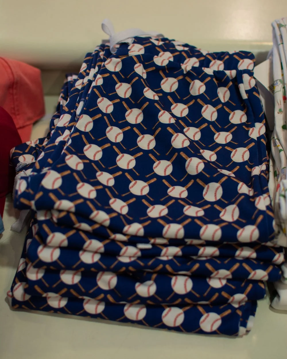 Lounge pajama pants from Lila and Hayes in new prints. Pick from baseball, golf, trout, basketball and more. These are super-soft and made from cotton!