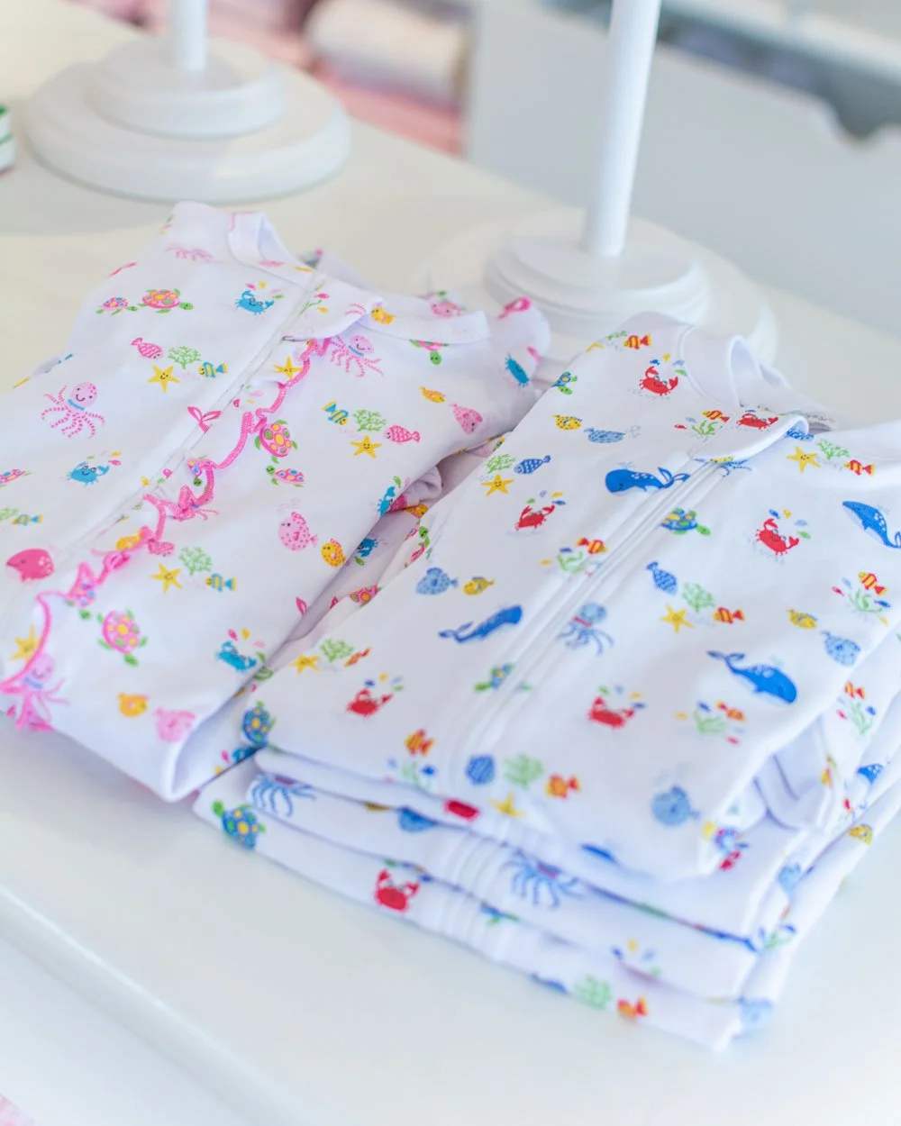Summer styles have arrived for infants too. Here is a little underwear scene from Kissy Kissy in both boy and girl colorways. We also have a new giraffe unisex sleeper in yellow.