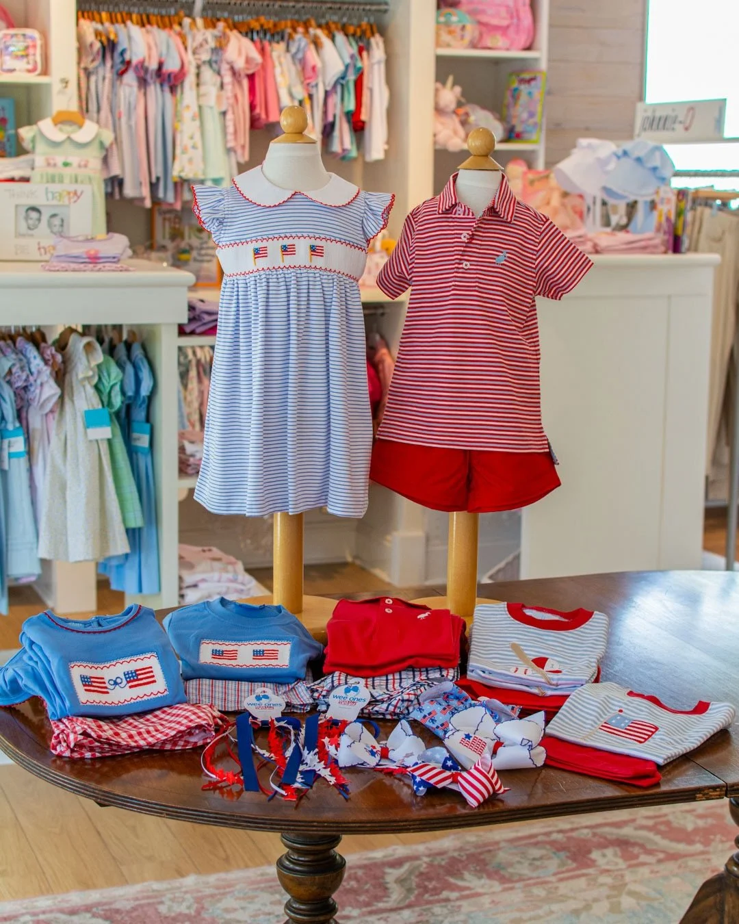 Shop at Fancy Pants from 9:30 to 5:30 pm and look at all of the red, white and blue outfits we have for Memorial Day, Fourth of July and baseball season. 🇺🇸