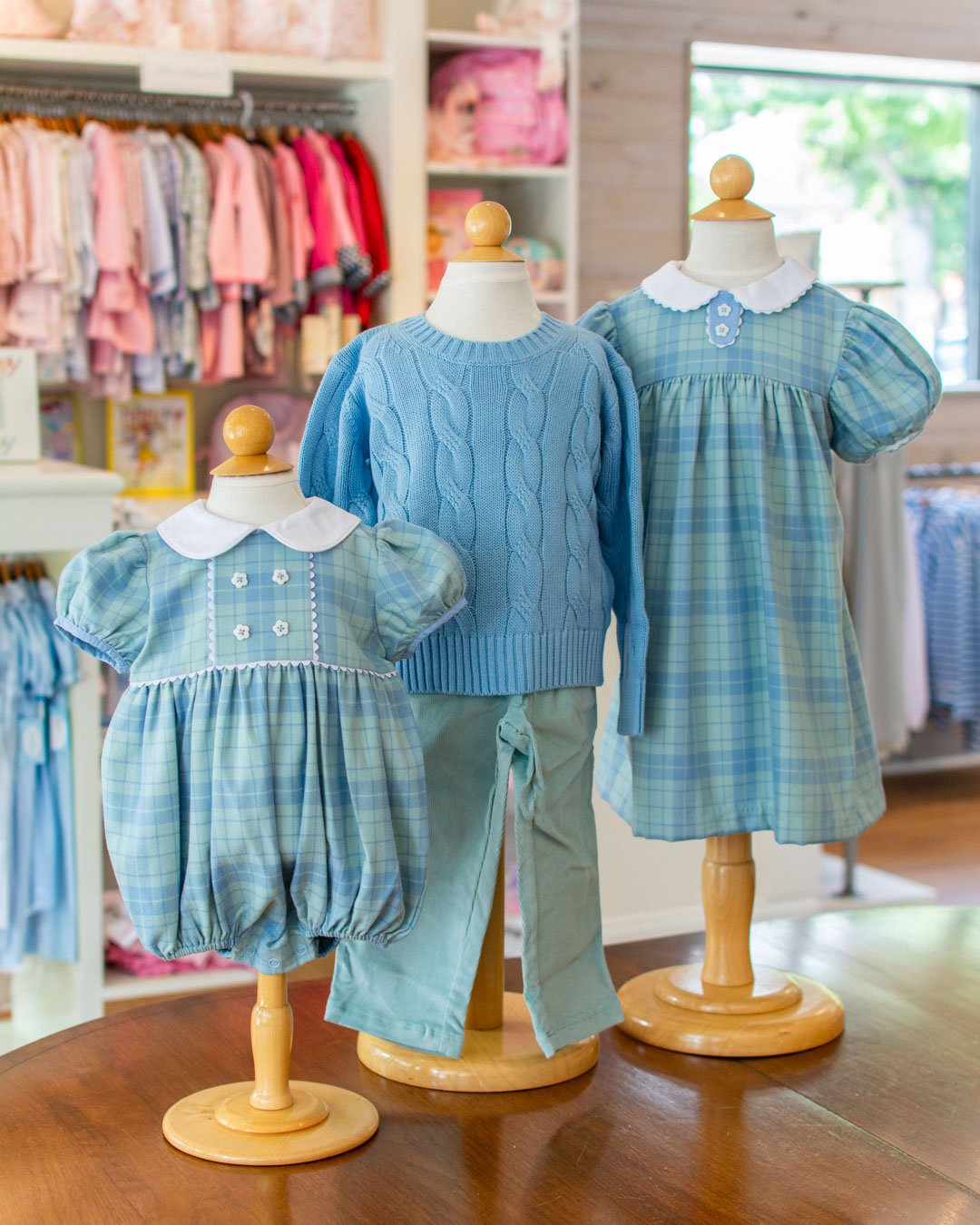 The shop has new autumn apparel arriving every day. This aqua blue and light mint color is an unexpected combo for the season.
