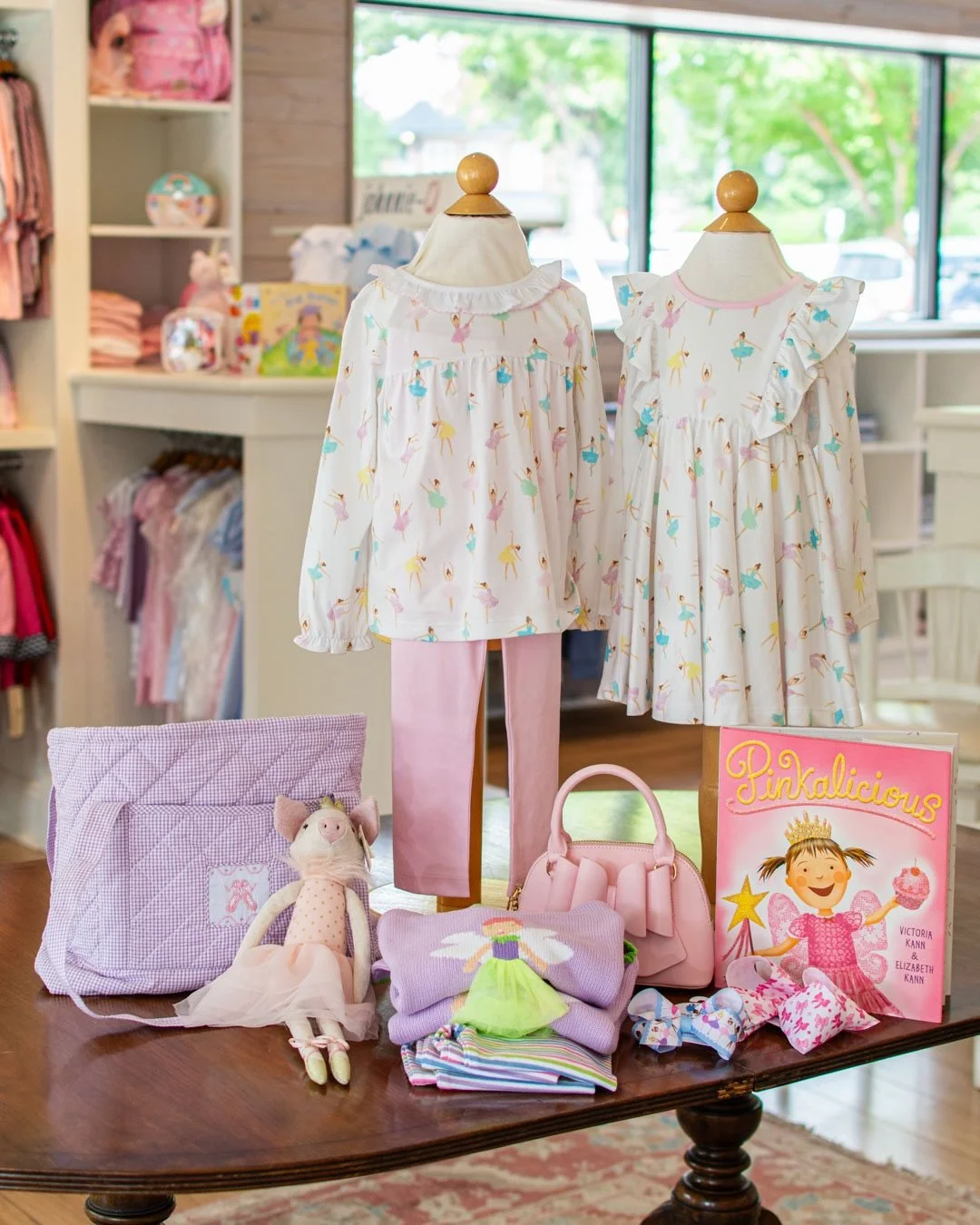 🩰 Beautiful ballerinas from @theproperpeony in a play dress and legging and tunic top combo. We styled the table with a ballet themed @zubels_petitami sweater, bows, and the cuties pig ballerina from @monami_designs. 🧑🏼&zwj;🩰

Charlotte children&