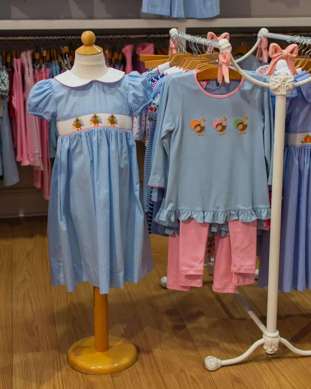 Girls outfits from Petit Bebe and Claire &amp; Charlie. Stop by or call the shop to get your Thanksgiving apparel!
