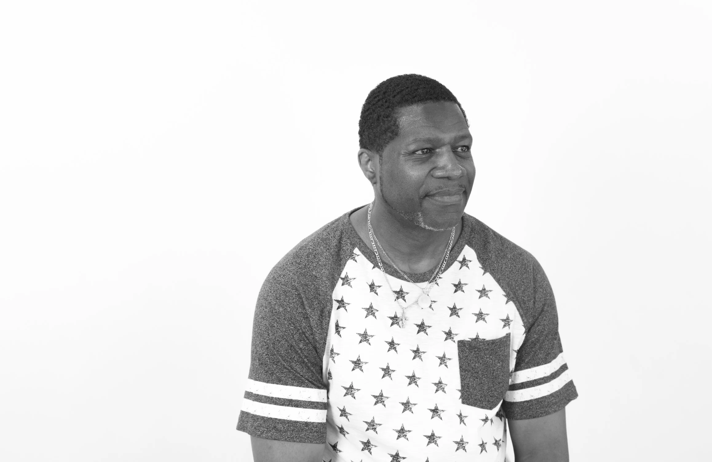 Isiah Anderson. Portrait by Jill Freidberg. Isiah moved to the Central District in the 80s and raised his son here. He runs the Teen Summer Musical program for Seattle Parks and Rec.