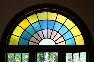 Stained glass windows make The Hall both vibrant and cozy.