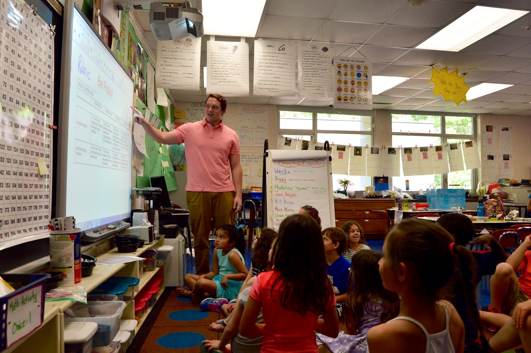 Dylan Miles teaching his second grade class at East School .