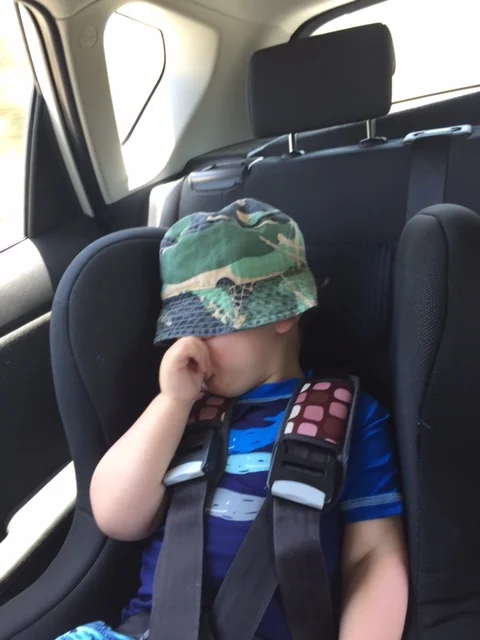 B passed out after a big day at the beach.