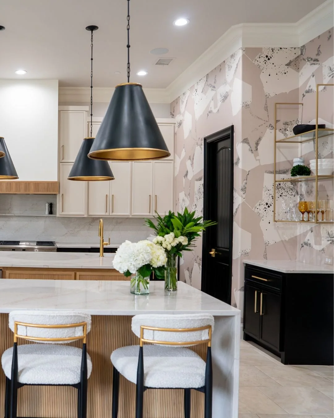 One of my favorite things in design is creating flow between spaces without making everything feel overly matched.

This kitchen was designed to seamlessly connect with the living space while still having its own personality &mdash; layered textures,