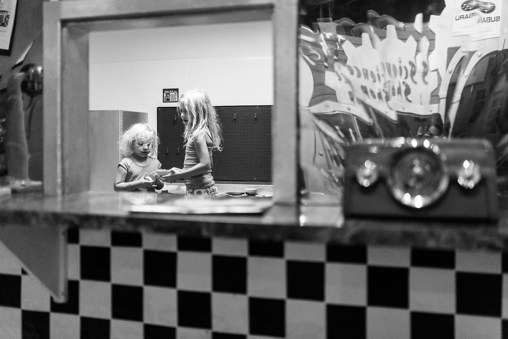 girls playing in children's diner