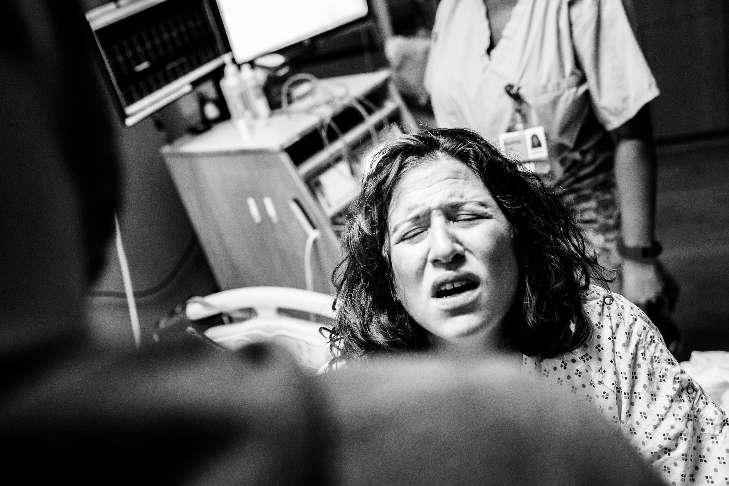 woman's face showing the pain of labor