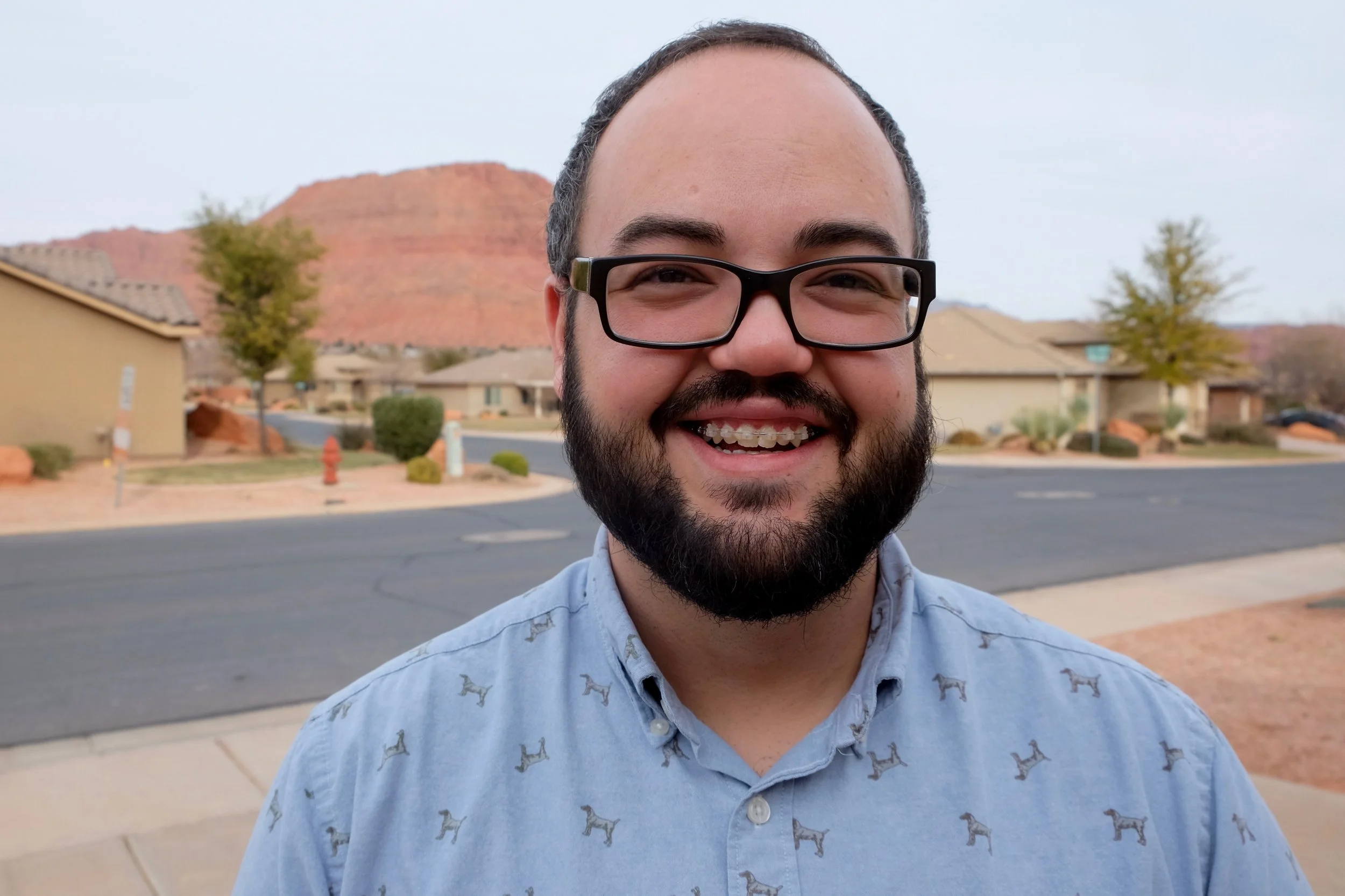 Randy Thomson, Executive Director of Youth Advocates of Southern Utah, outside his home in Ivins, Utah. (Photo by Andrea Smardon)
