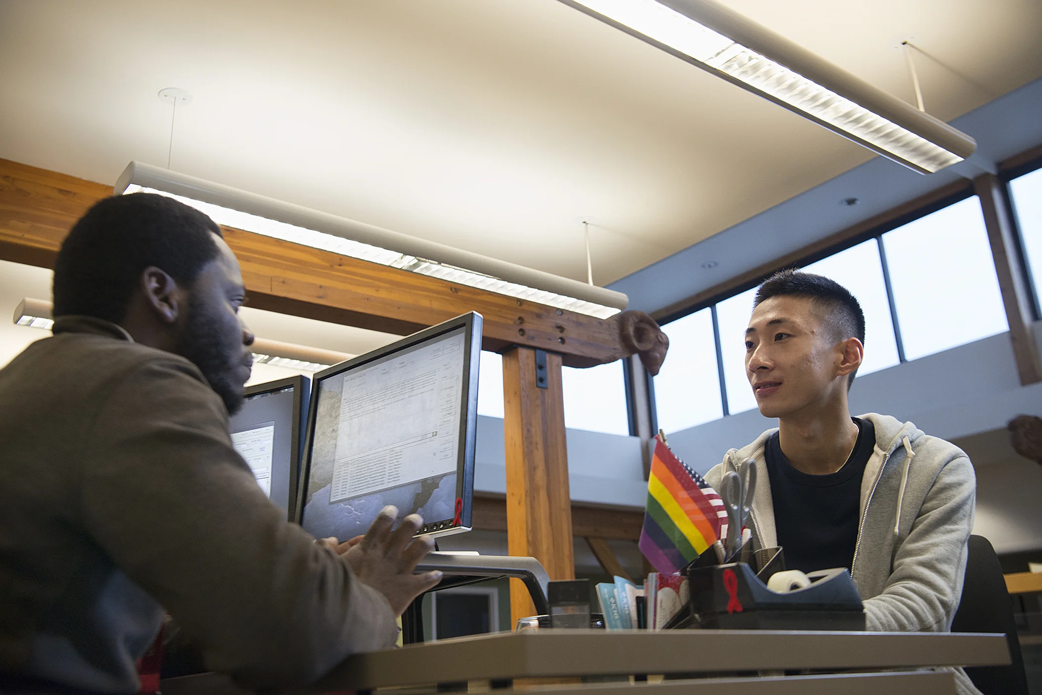 Case manager and client sitting at a desk