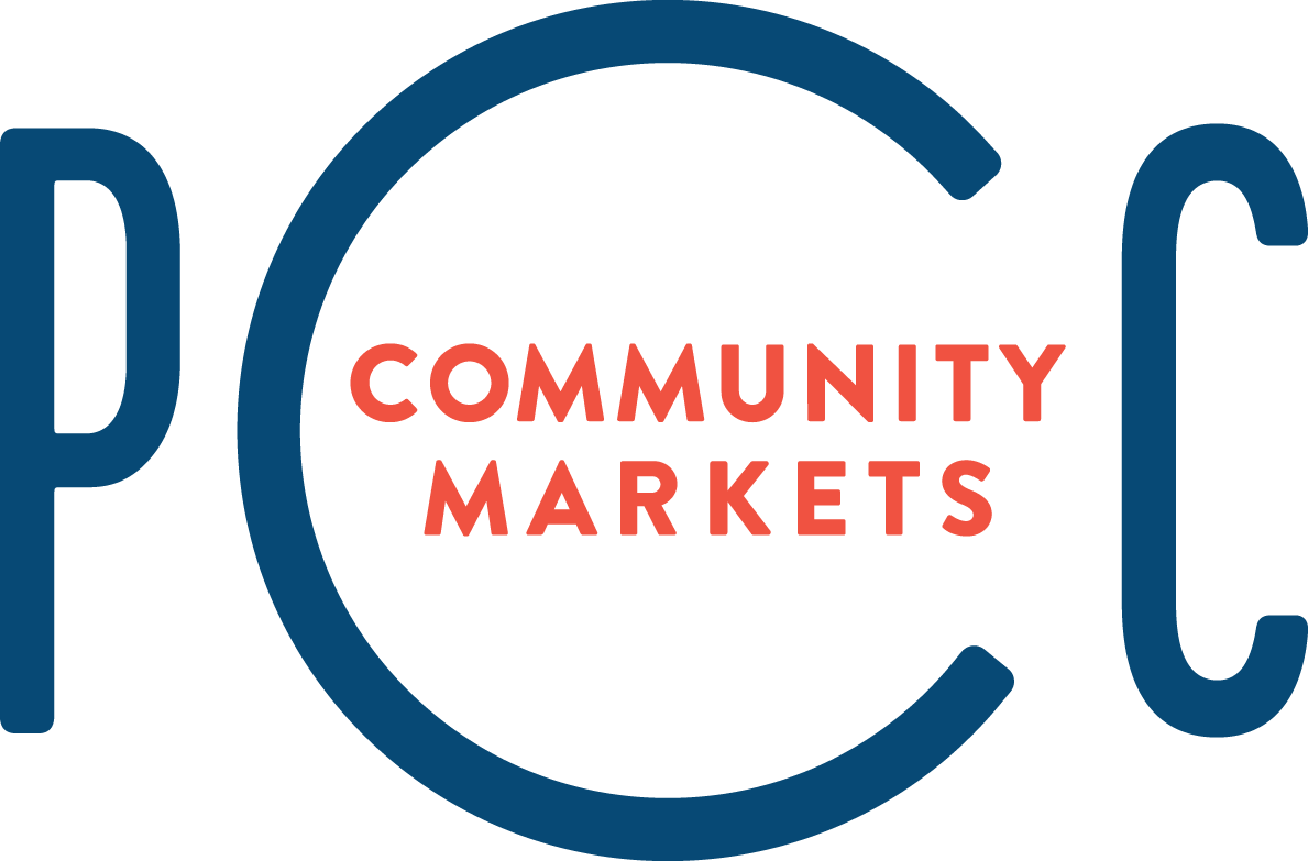 PCC Community Markets logo in blue and orange lettering