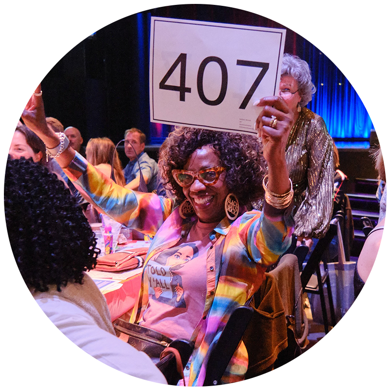 Image of woman celebrating at Gay Bingo event