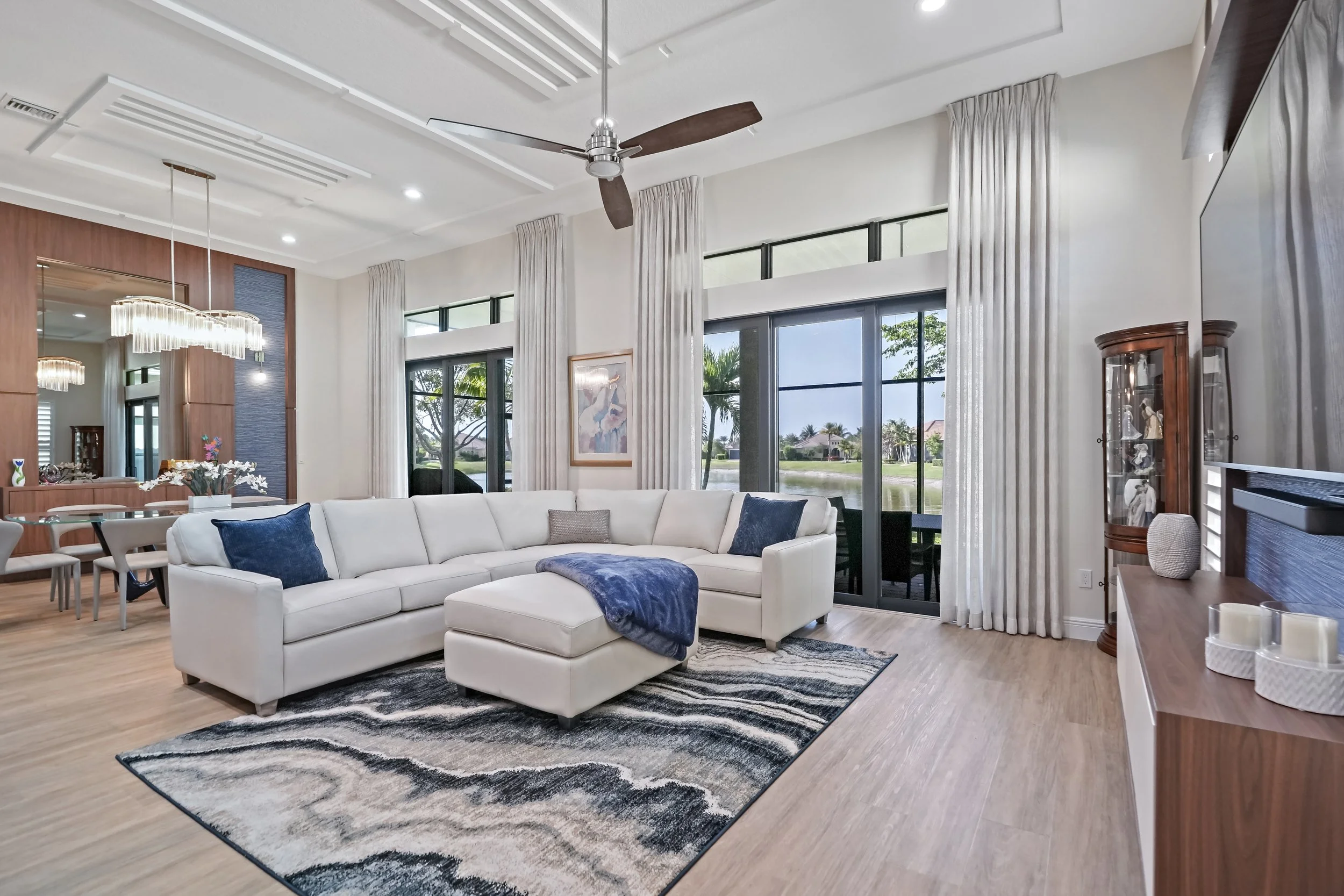 Ceiling design to create definition of spaces in great room.