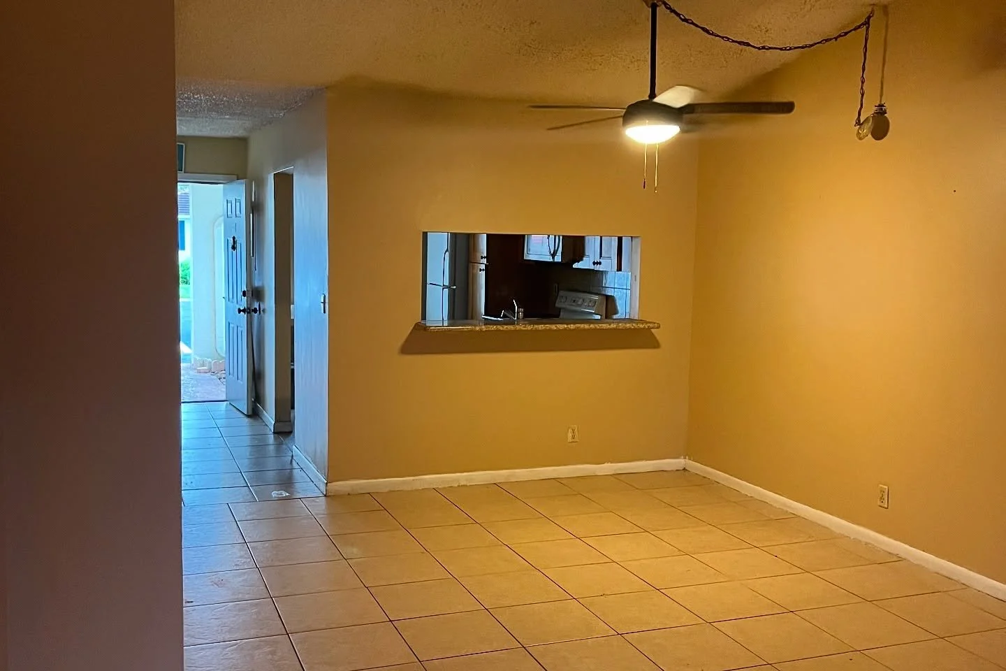 BEFORE - VIEW TO KITCHEN FROM FAMILY ROOM