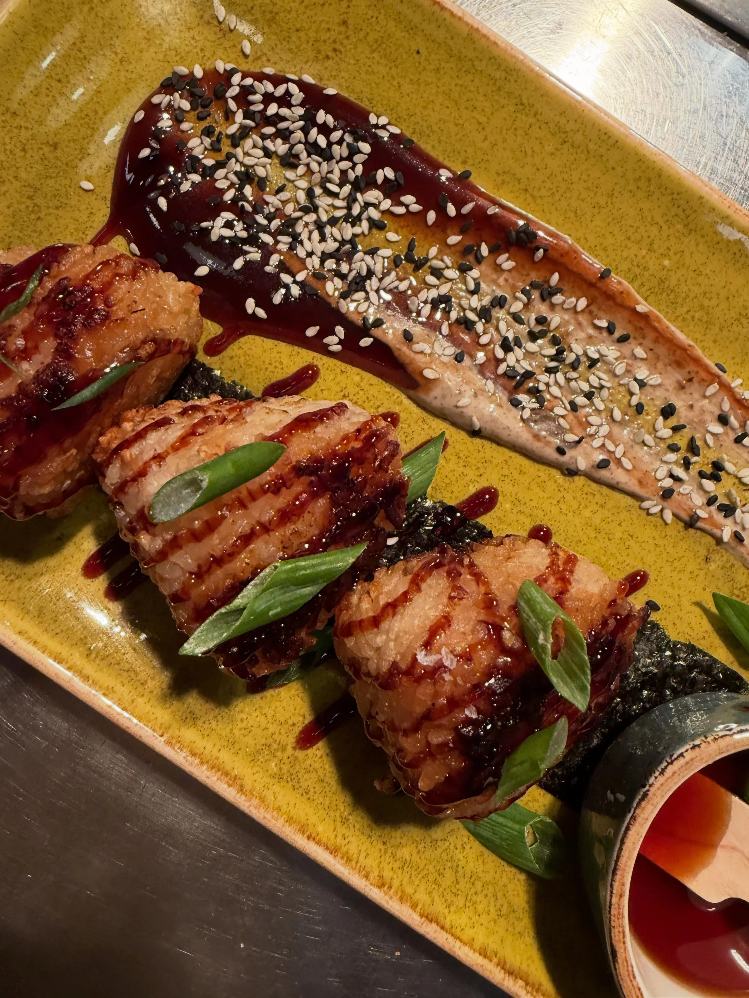 Our newest creation&hellip; Yakionigiri. Stuffed with Cream cheese miced with duxelle mushrooms and chard serranos&hellip; with a hoisin and Ponsu sauce&hellip; so delicious for a fun night out!! 🍙❤️😁 #juliyjuan #persimmonresidency #fortcollins #lo