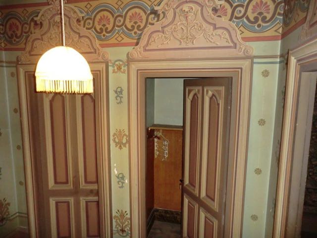 top of stairs, landing