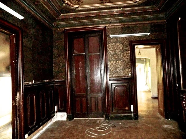 Before we painted the varnished wood, making the room larger and lighter. We also lifted off the vinyl which uncovered gorgeous oak floorboards.