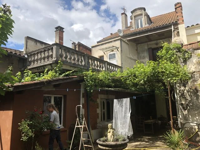 Lime washing the kitchen wall