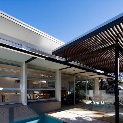NORTH BALGOWLAH 01 ALTERATION + ADDITION A two bedroom weatherboard cottage has been transformed into a large family home with the addition of a two storey, light filled pavilion. A northern orientation and the creation of covered outdoor areas allows sunlight to be manipulated to maximum effect. Bespoke joinery solutions provide a seamless, cohesive interior. SITE: 583sqm / BUILD: 203sqm / COMPLETED: Jun 11 / BUILDER: Andrew Newman Building & Chase Projects (Brenden Rudd) / PHOTO: Simon Whitbread
