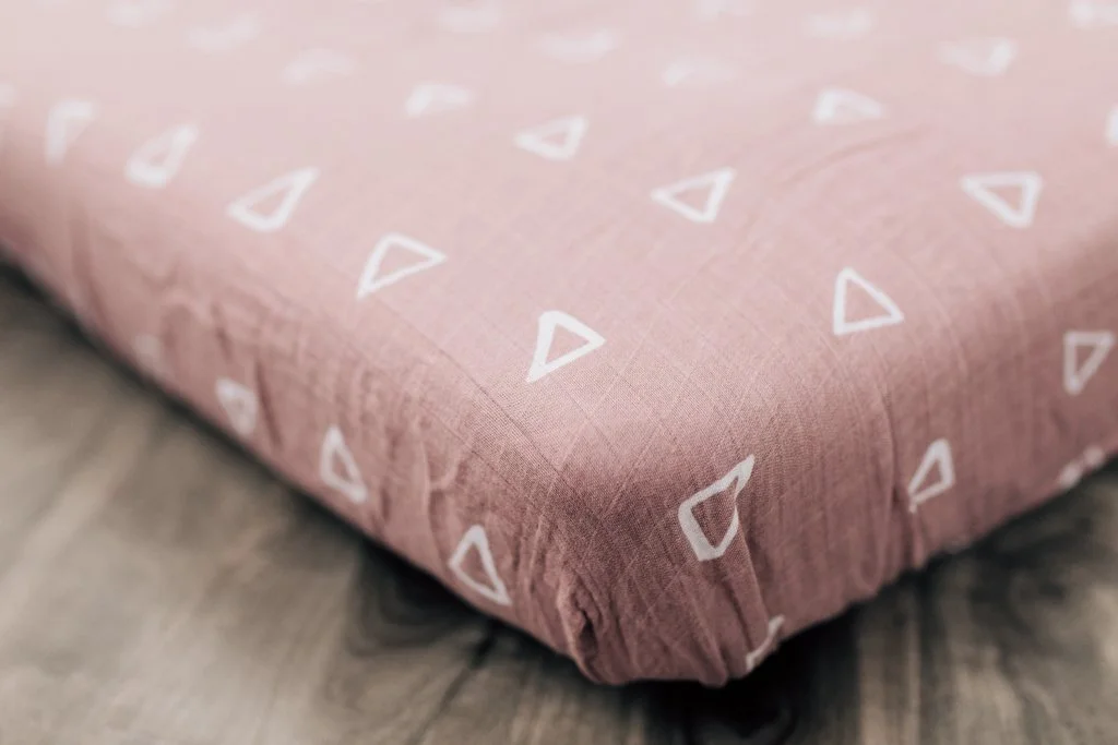mauve crib sheet