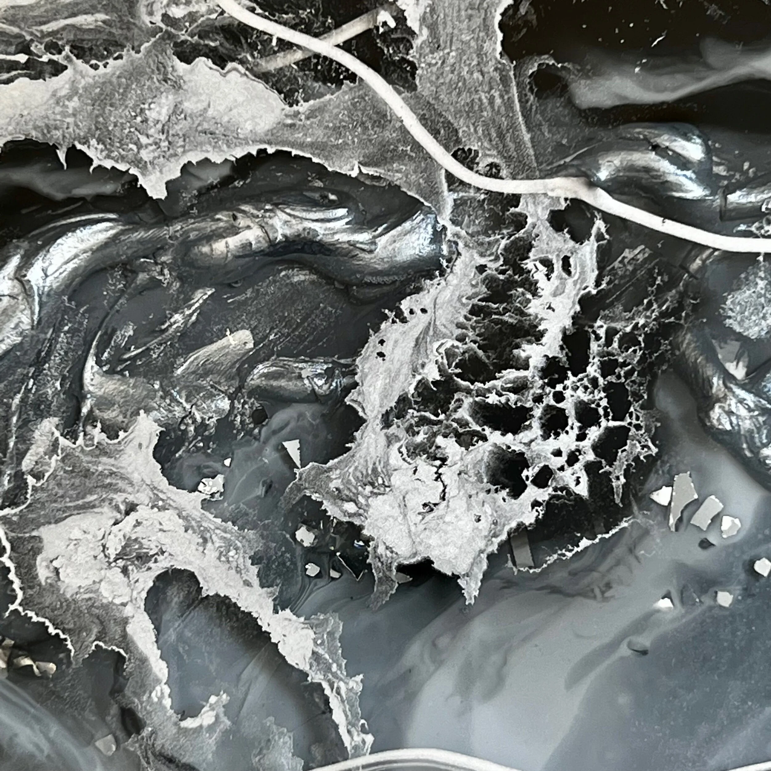Pearl painting detail shot three using black, white and silver abstracted with many resin layers