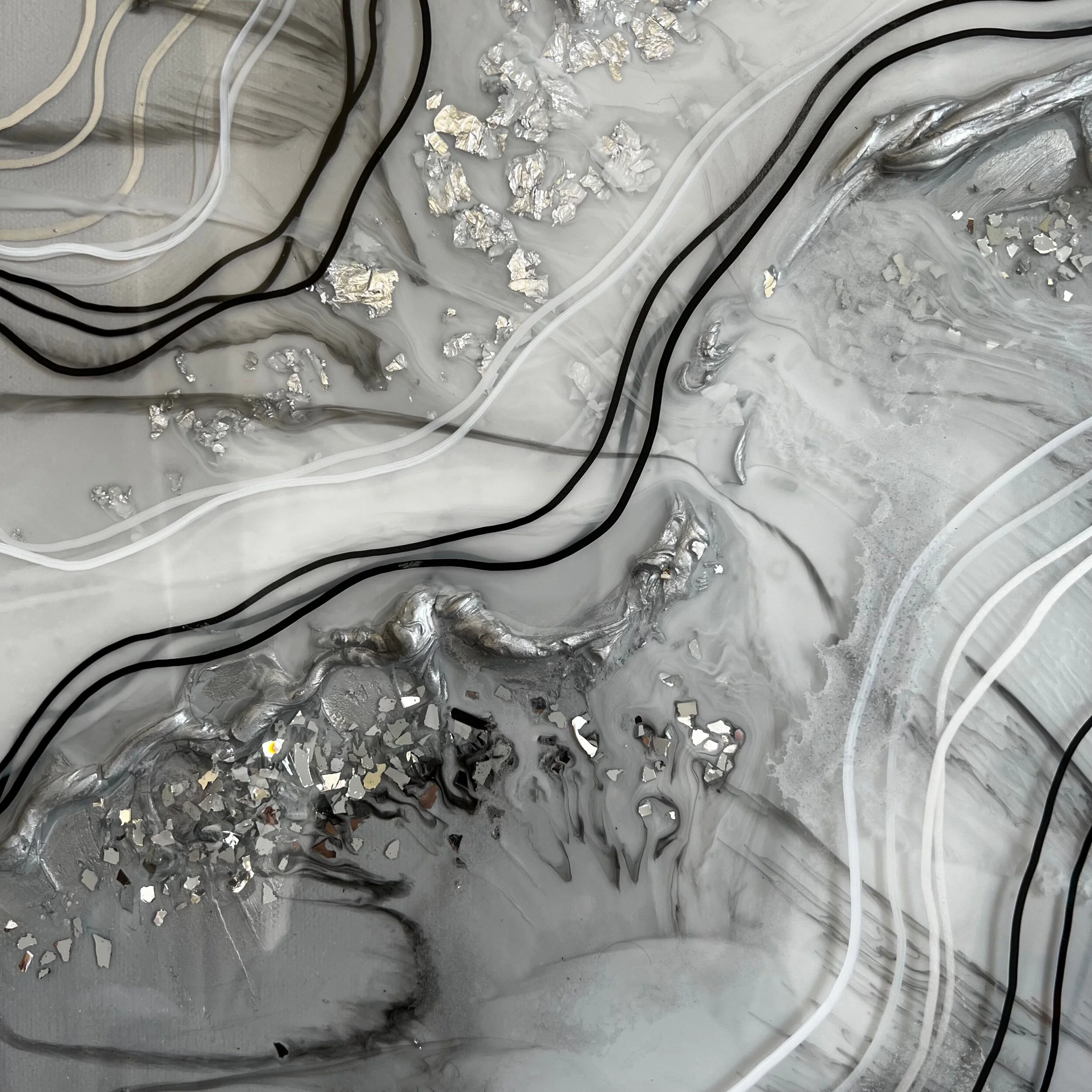 Pearl painting detail shot two using black, white and silver abstracted with many resin layers