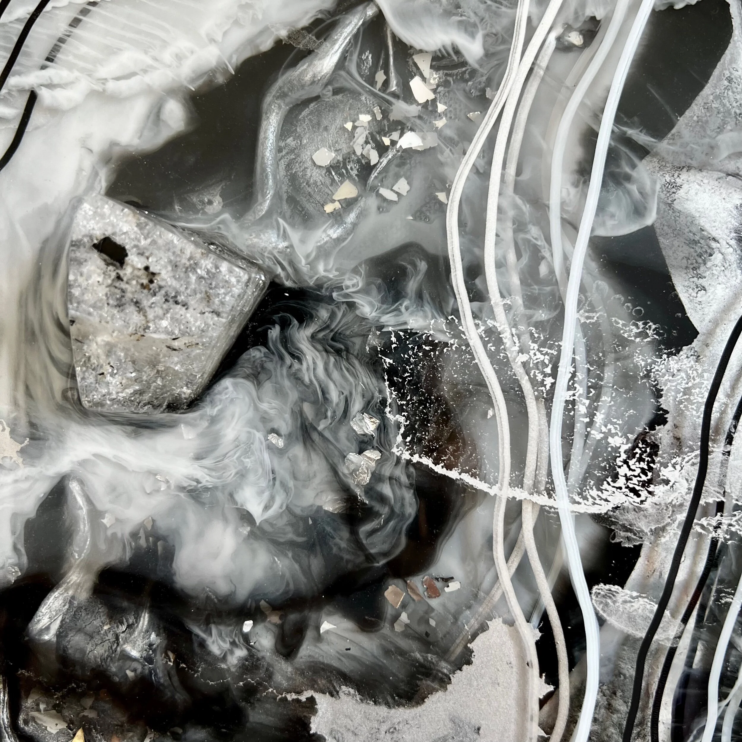 Pearl painting detail shot four using black, white and silver abstracted with many resin layers